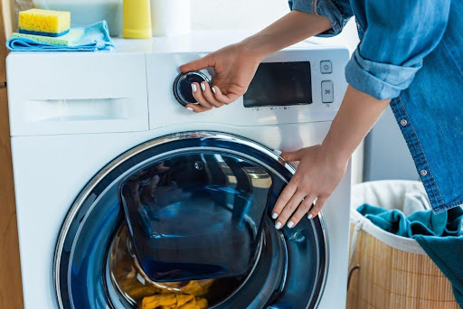 Với máy giặt bị nhiều bột giặt