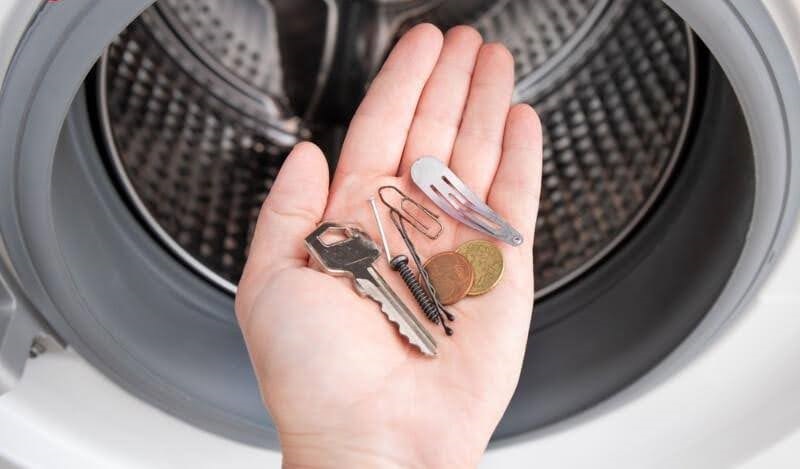Kiểm tra dị vật trong lồng giặt